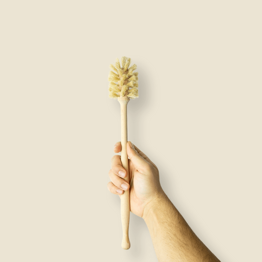 Mão a segurar no escovilhão madeira EcoX